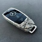 Mercedes Slim Rectangle handcrafted key case Nickel Silver front view with ornate floral cross engraving and three-pointed star emblem