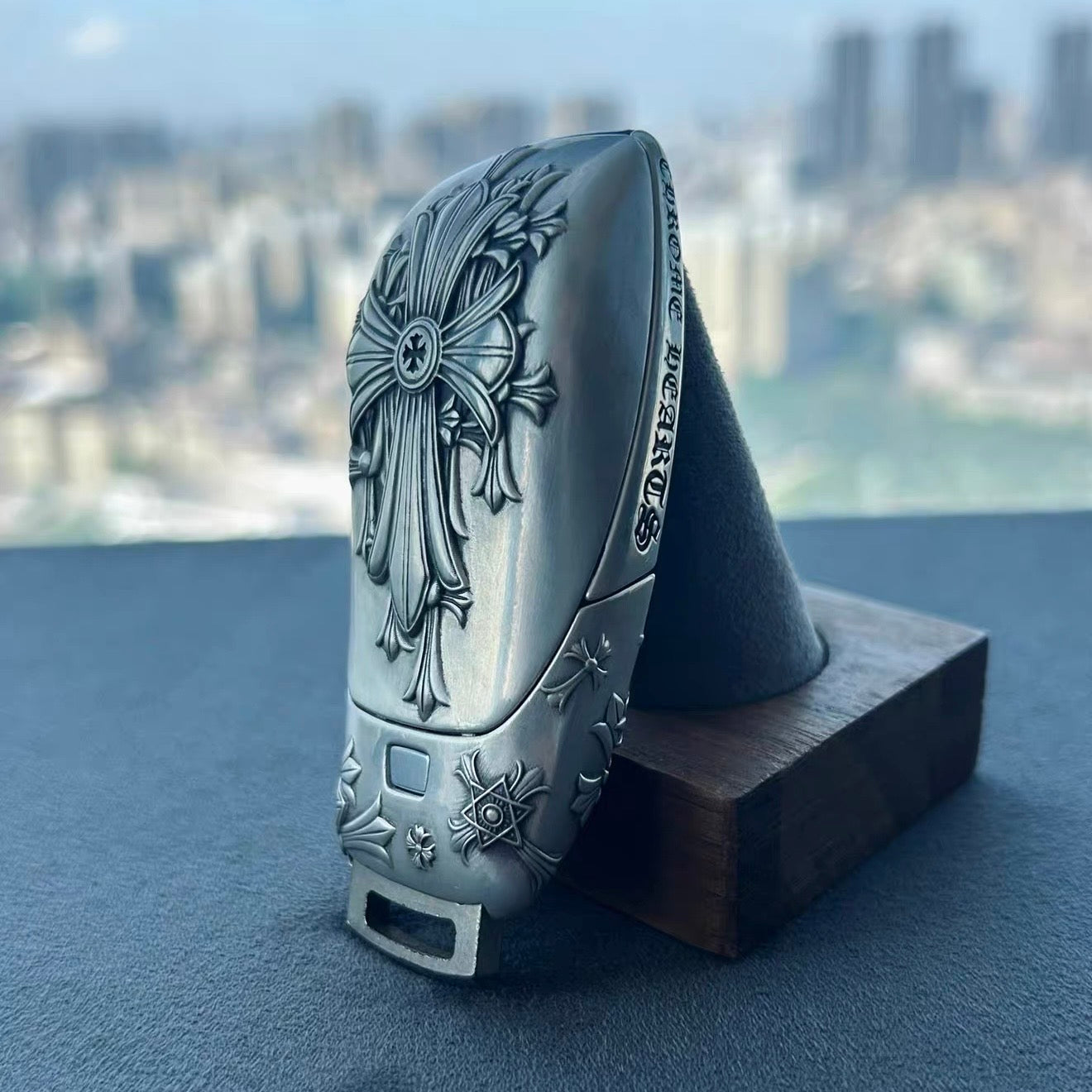 Hand-finished floral cross engraving detail on IGNIS ARGENTUM Mercedes slim rectangle key case side view showing refined craftsmanship