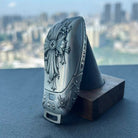 Hand-finished floral cross engraving detail on IGNIS ARGENTUM Mercedes slim rectangle key case side view showing refined craftsmanship