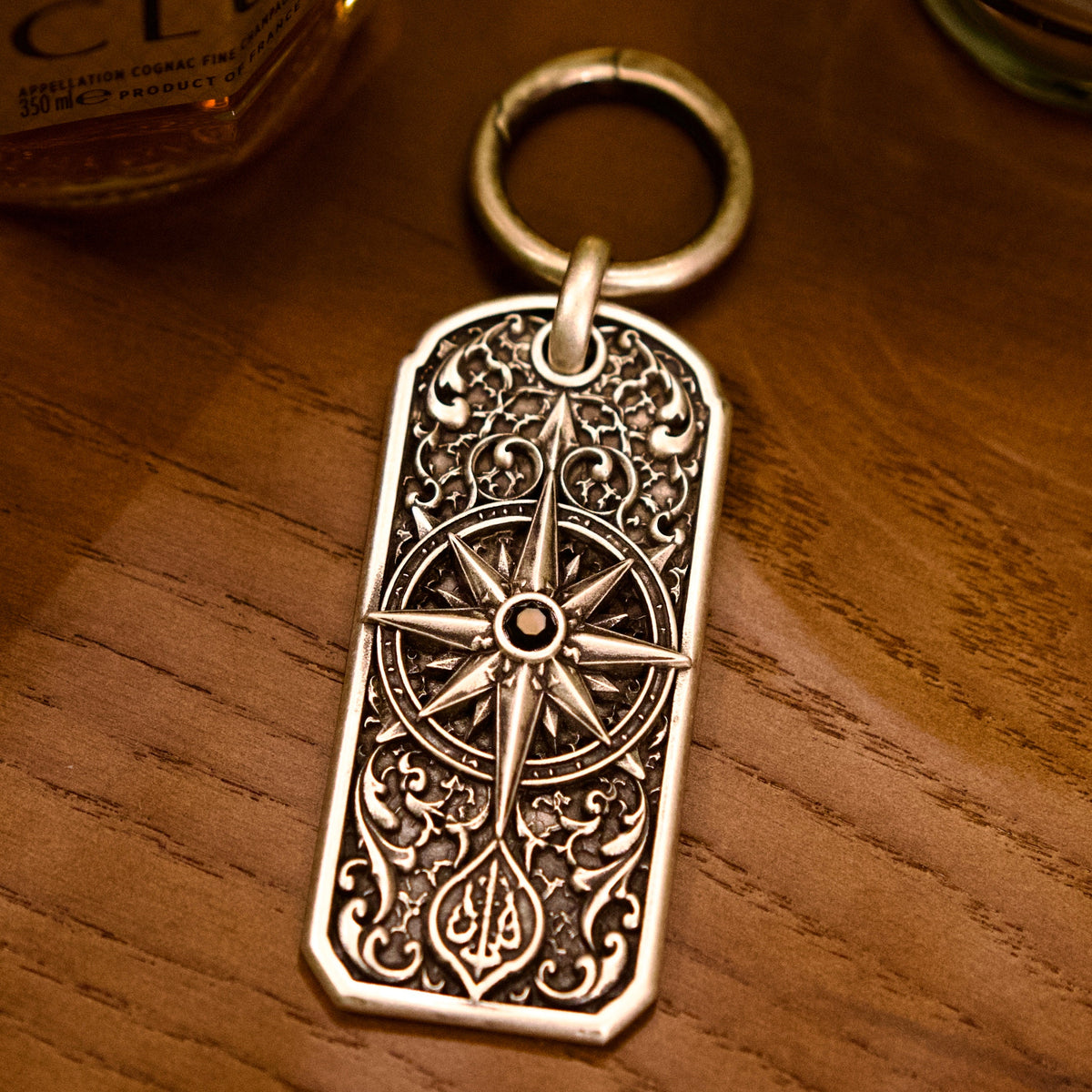 Meridian Heirloom Personalized Key Tag, front view beside a car key