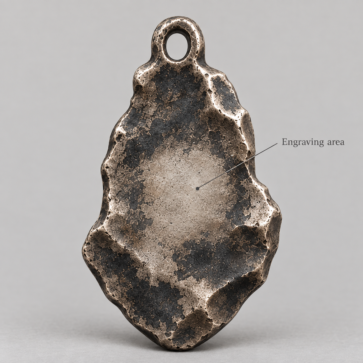 Ares keychain charm design preview, back view, showing the rear texture and engraving area