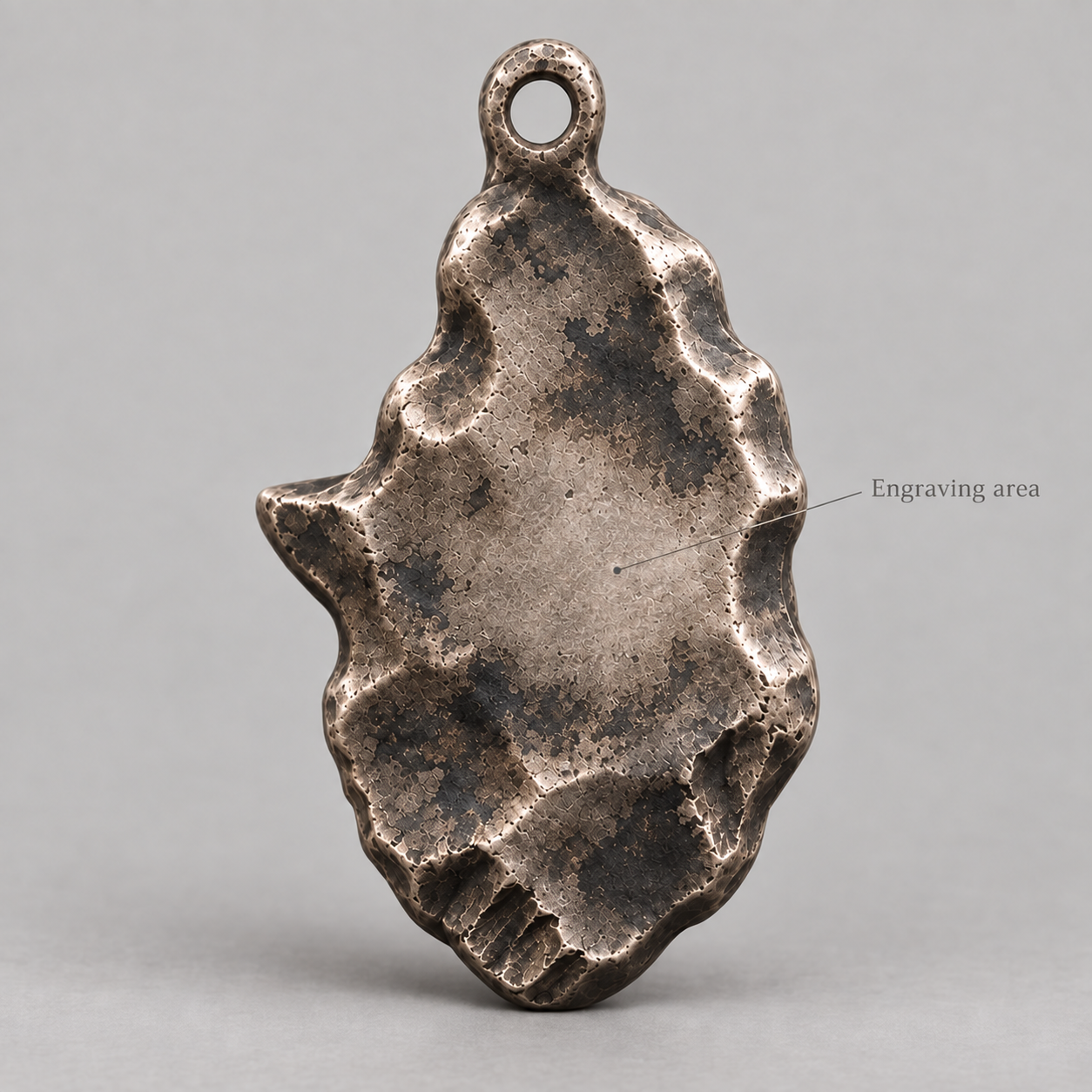 Hephaestus keychain charm design preview, back view, showing the rear texture and engraving area