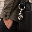 Medusa pendant styled on a bag with a separate connector; styling visualization