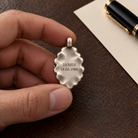 Medusa pendant back with optional JAMES and 14.06.1986 engraving example; design visualization