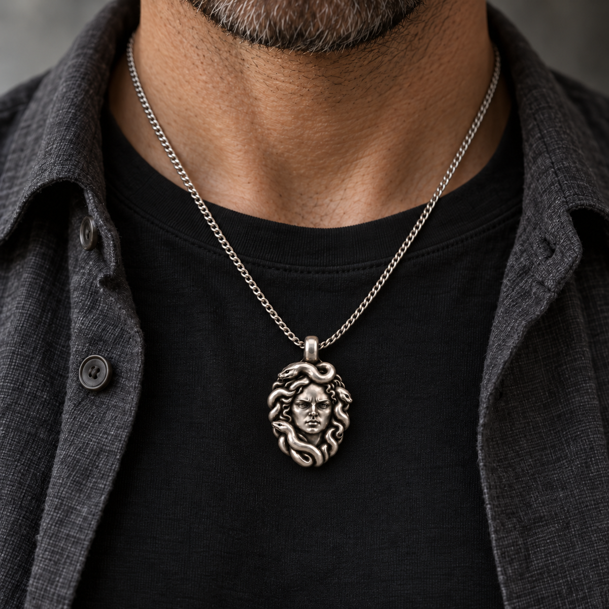 Medusa pendant worn on a separate chain; styling visualization