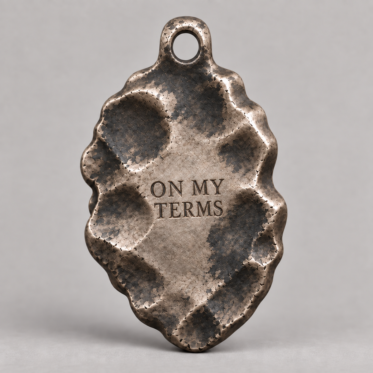 Medusa charm, personalized back engraving example: ON MY TERMS