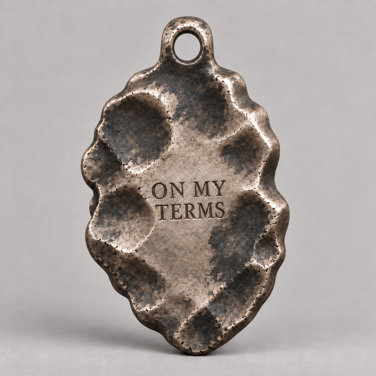 Medusa charm, personalized back engraving example: ON MY TERMS