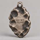 Medusa charm, personalized back engraving example: ON MY TERMS