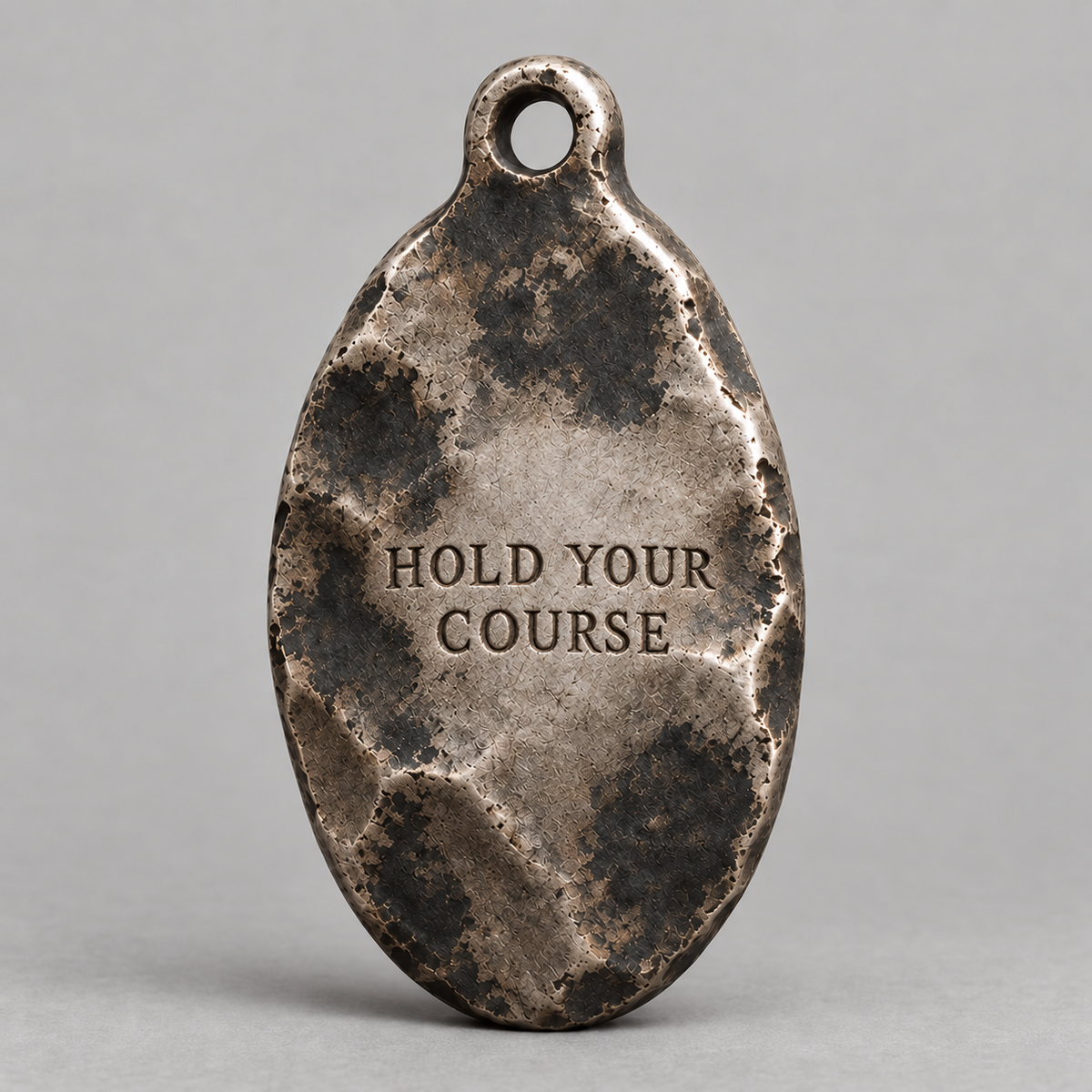 Poseidon charm, personalized back engraving example: HOLD YOUR COURSE
