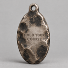 Poseidon charm, personalized back engraving example: HOLD YOUR COURSE