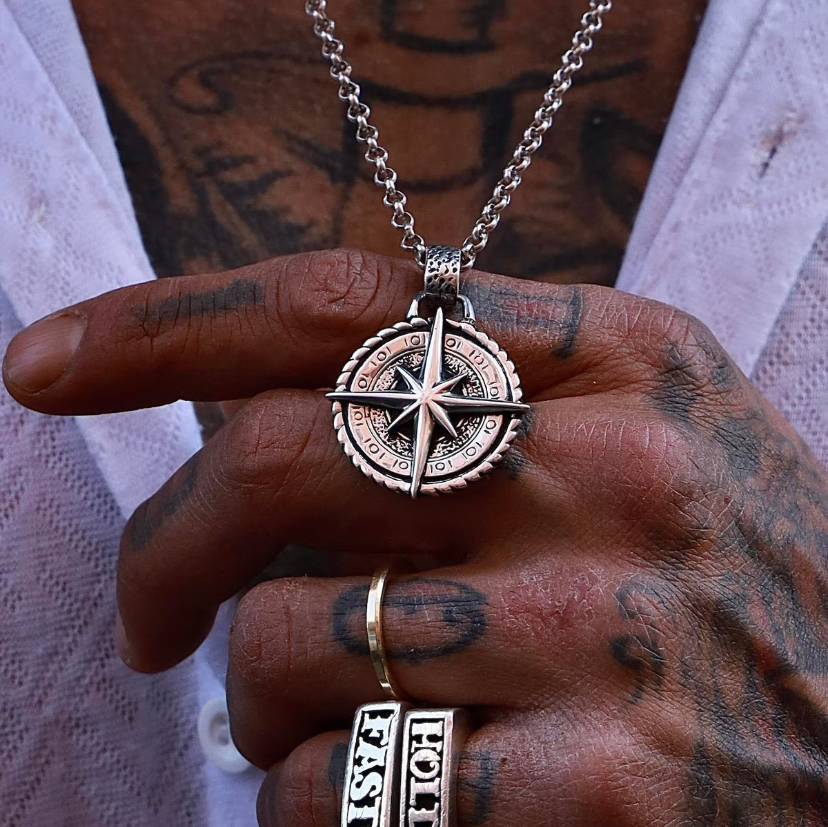 Nautical Compass 925 Silver Pendant, front view beside a car key