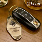 Personalized metal key tag paired with a remote car key