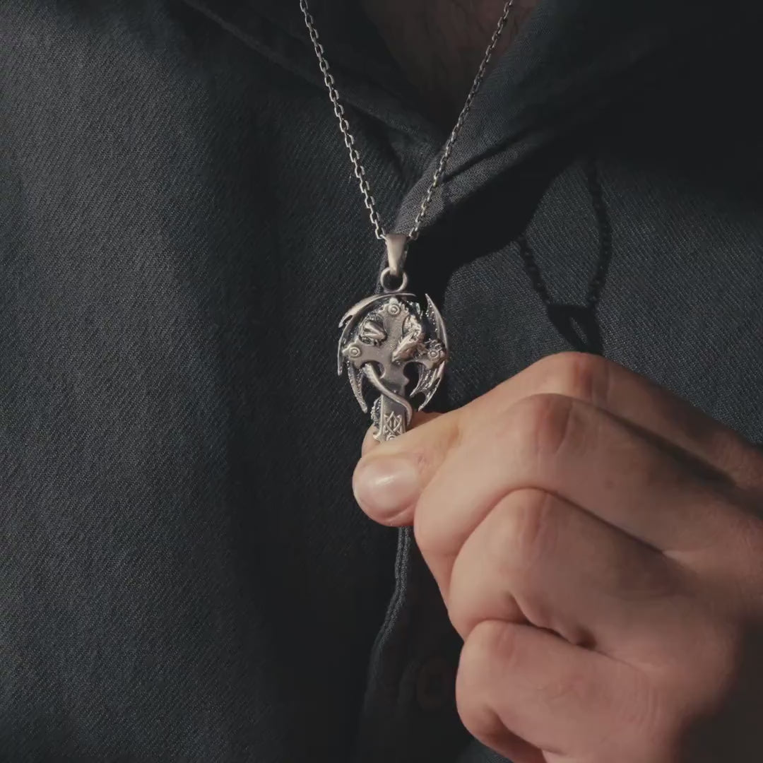 Video showing a dragon cross sterling silver pendant worn as a necklace