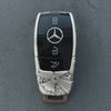 Video showcasing a Mercedes-Benz slim-rectangle silver key case