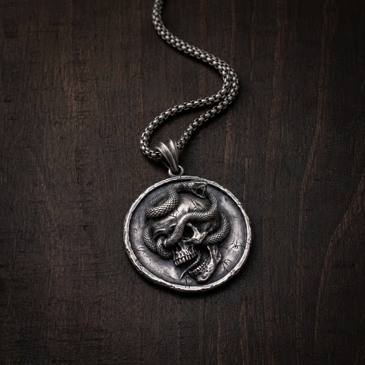 Serpent Skull Medallion Pendant, worn on a chain