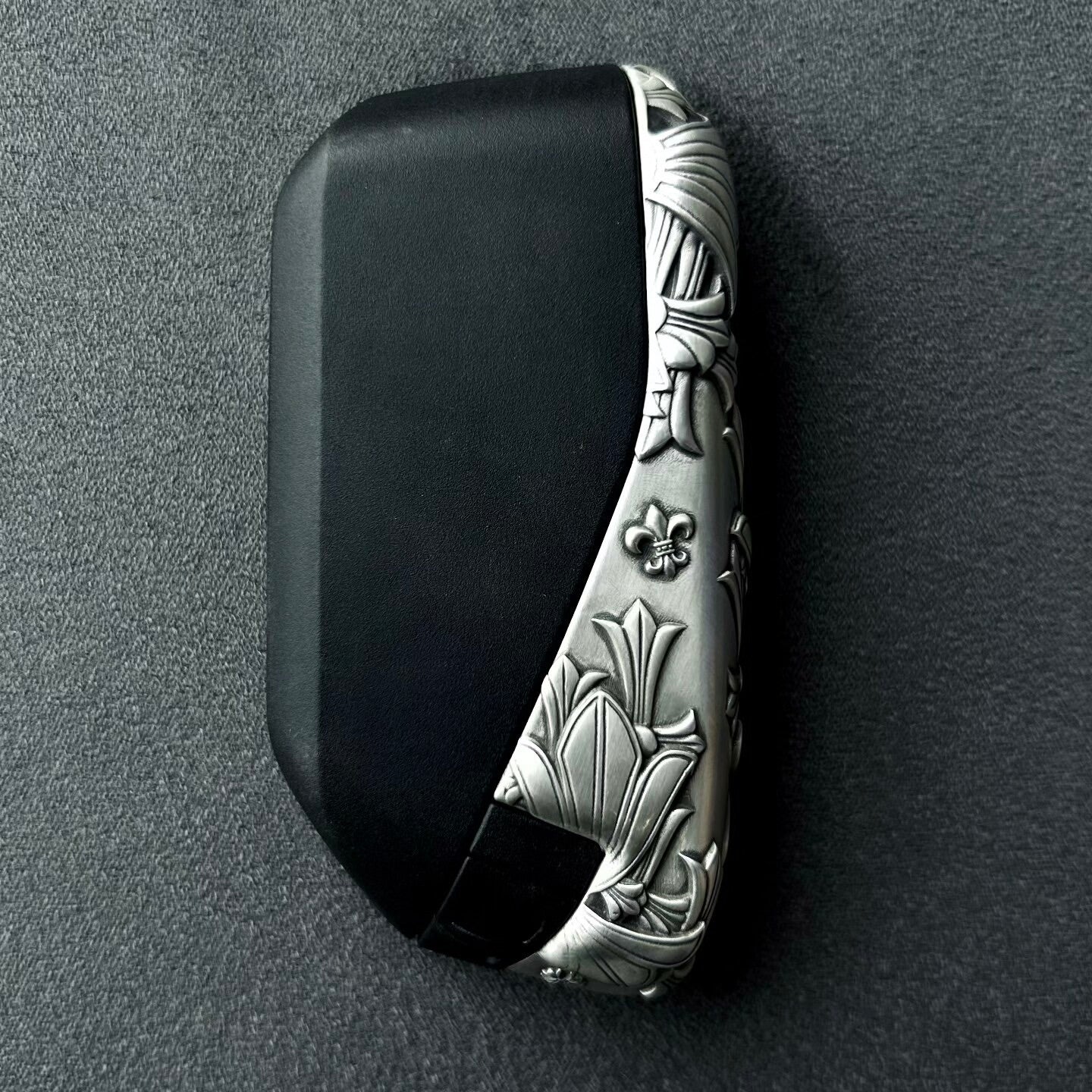 Side profile showing hand-finished faceted blade design on 925 Sterling Silver frame