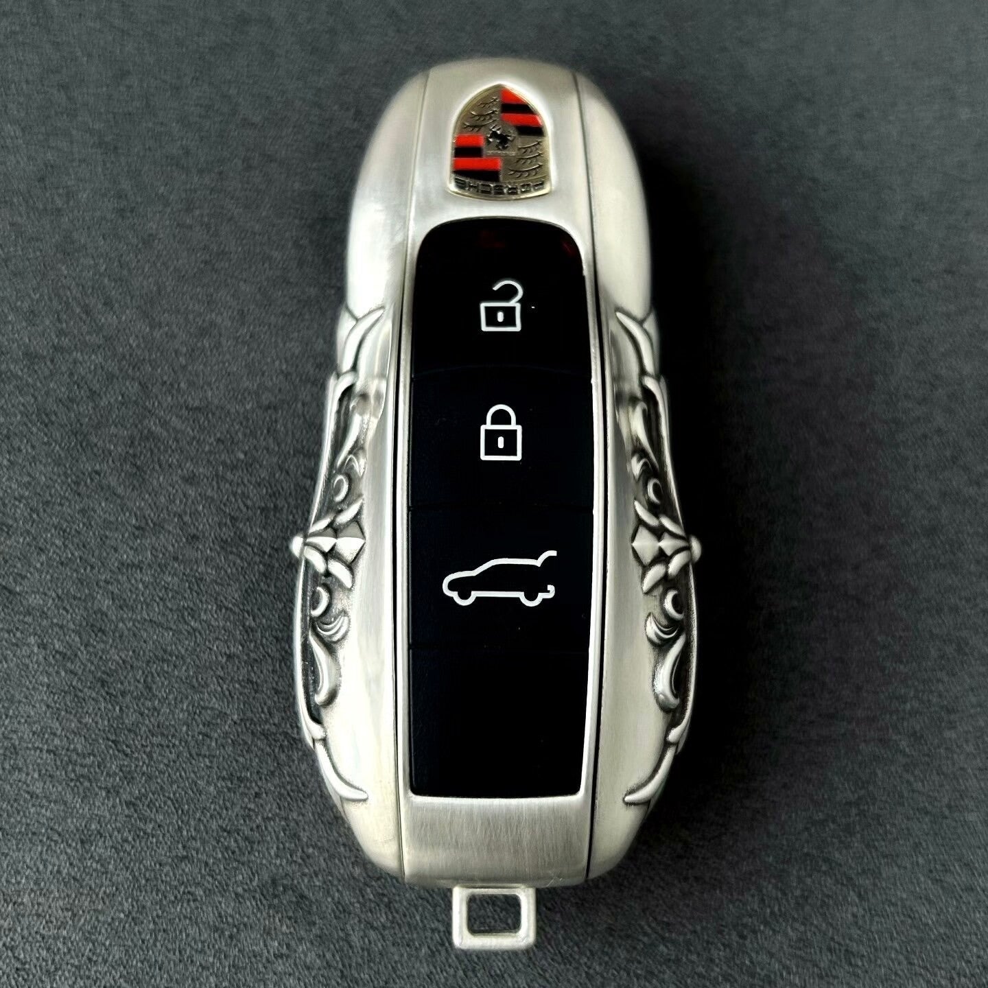 Side profile showing hand-finished 925 Sterling Silver frame on Porsche GT3rs/Macan/718 key fob