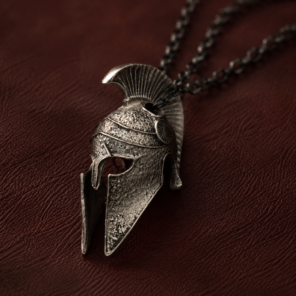 Spartan Helmet Talisman Pendant, displayed on a dark surface