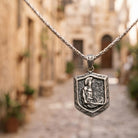 Spartan Shield & Sword Pendant, displayed on a dark surface