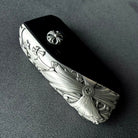 Sterling Silver BMW key case displayed with understated elegance on dark surface
