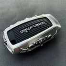 Sterling Silver Ford Bronco Raptor key case with floral scrollwork engraving and original RAPTOR badge preserved