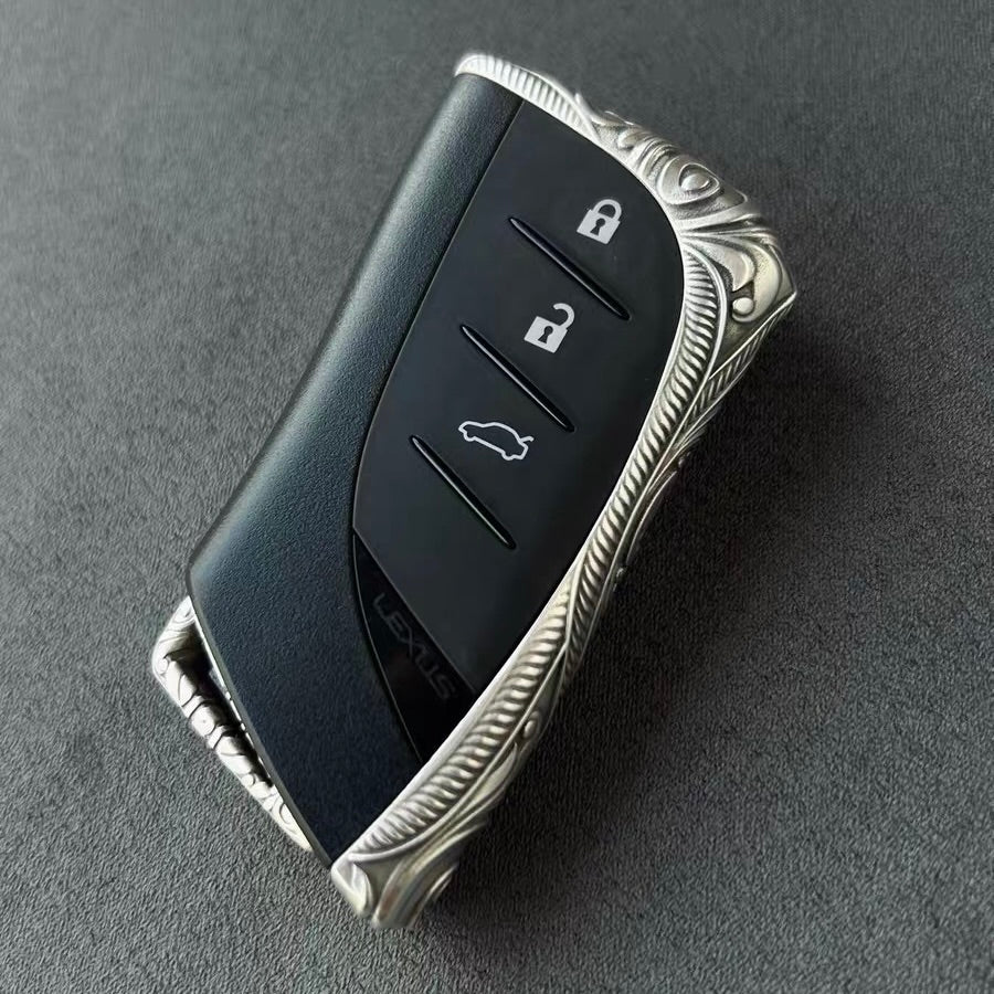 Top angle view of precision-crafted Lexus key case with oxidized accent details