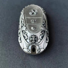 Sterling Silver Mercedes key case displayed with understated elegance on dark surface