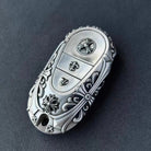Sterling Silver Mercedes Key Case with rounded capsule motif and floral scrollwork engraving