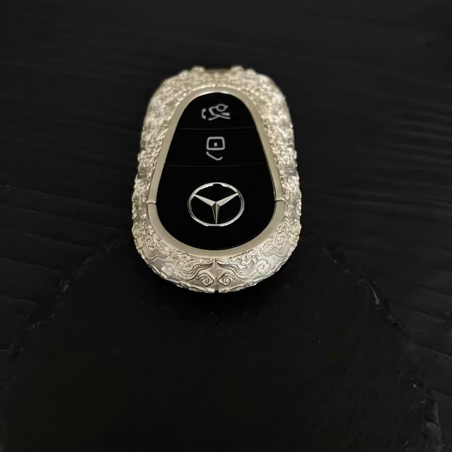 Side profile showing rounded capsule design and precision-crafted cloud texture pattern