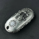 Top angle view of precision-crafted Mercedes key case with oxidized accent details