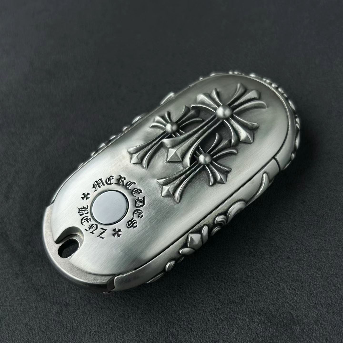 Top angle view of precision-crafted Mercedes key case with oxidized accent details